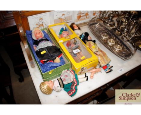 A Pelham puppet and various dolls 