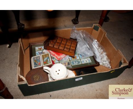 A box of miscellaneous items to include a surveyor's tape, a hip flask, a shaving mug, porcelain thimbles etc. 