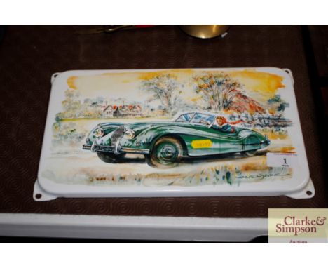 An enamel plaque of a Jaguar XK120