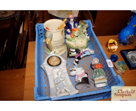 A musical Widdecombe Fair jug; a  porcelain cased mantel clock; various figures etc.
