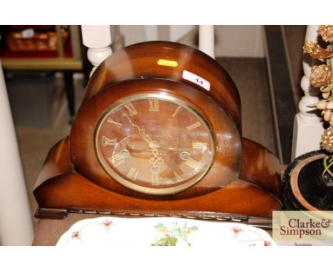 A three hole mantel clock 