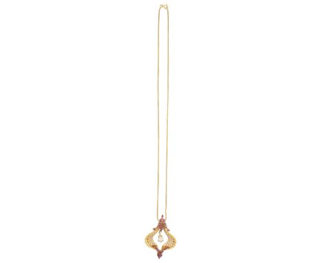   Diamant-Rubin-Collier Amouröses Ensemble in Gelbgold 14K. Ein Ensemble aus feinen Diamanten von zus. ca. 1,5 ct. umschliess