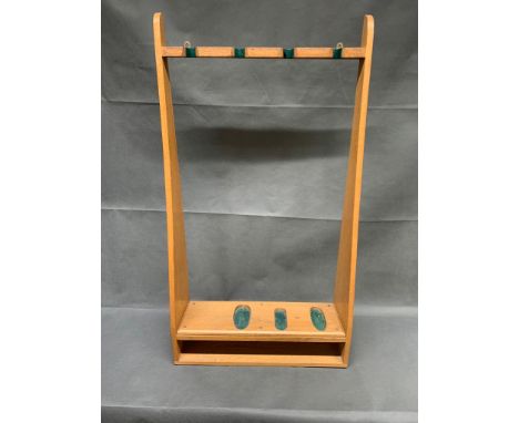 A vintage oak gun rack 93 cm high