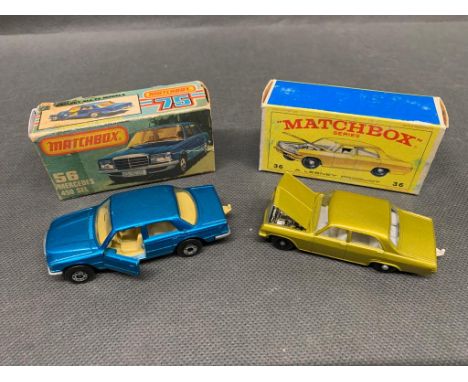 2 x matchbox cars, a 36 Opal Diplomat and a 56 Mercedes 450 sel