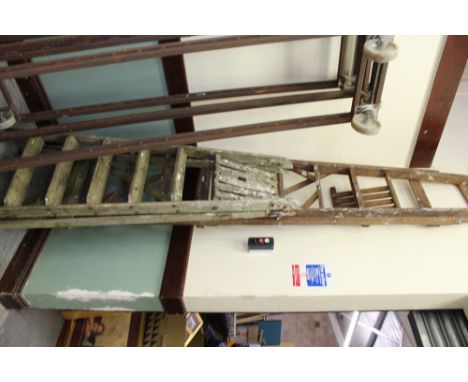 2 wooden step ladders