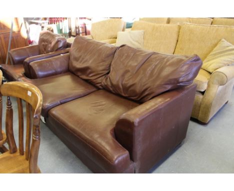 Brown leather sofa bed and chair