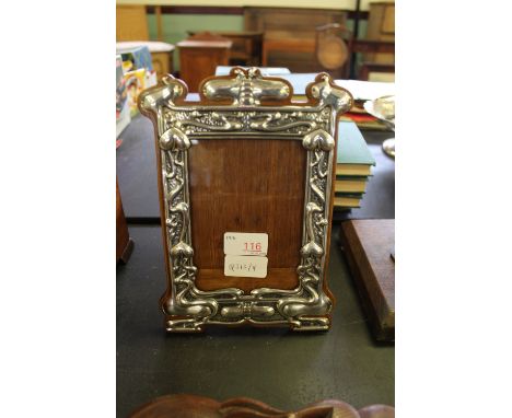 An Edward VII silver photograph frame of Art Nouveau design, the border of sinuous leaf design, Chester 1902 by William Neale