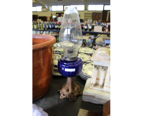 Cast iron & glass oil lamp