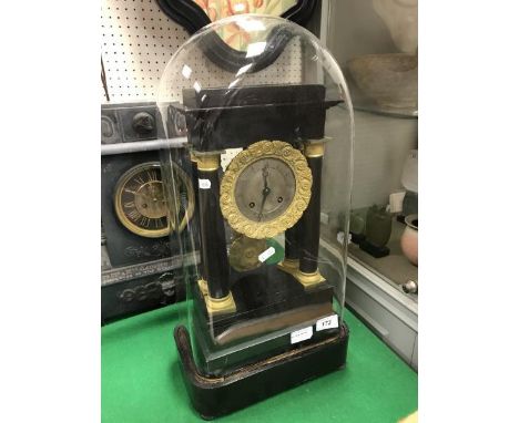 A 19th Century French ebonised and gilt brass cased clock of architectural form, the eight day movement by Raingo Frères with