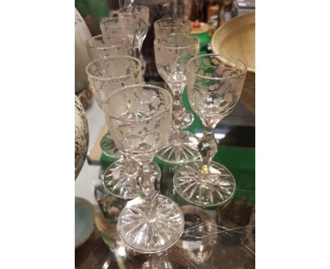 A set of eight 19th Century cordial glasses, the bowls decorated with symbols of the Empire, rose, thistle and shamrock on a 