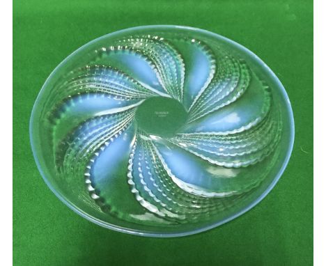 RENE LALIQUE (1860-1945) - an opalescent and clear glass "Fleurons" plate, the underside moulded with spiralling bands, acid 