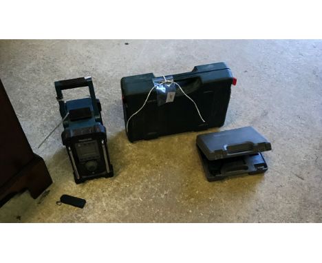 A large collection of tools to include drills, jacks and a saw