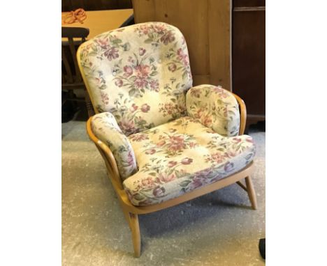 A pair of Ercol "Jubilee" beech framed open arm chairs circa 1985, designed by Don Pedal circa 1980, re-upholstered circa 200