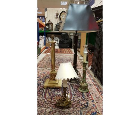 A pair of modern brass reeded column table lamps, a pair of brass chamber stick type table lamps and four various other table