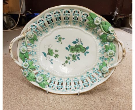 A Worcester First Period Dr Wall pierced oval dish with floral encrusted decoration to the two branch handles, bears hand-wri