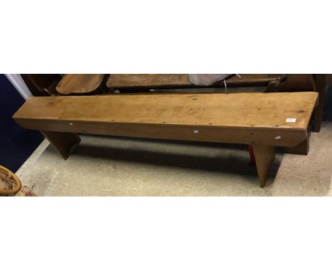 A late 17th Century oak oval gate-leg drop-leaf dining table on bobbin-turned supports united by stretchers