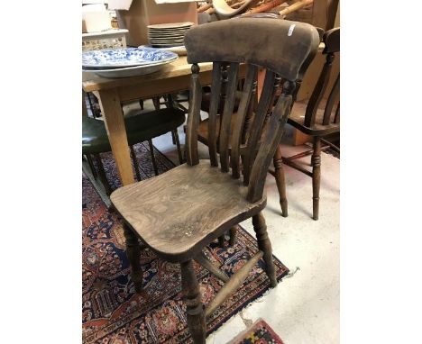 A set of five Victorian slat back kitchen chairs and a similar stick back chair