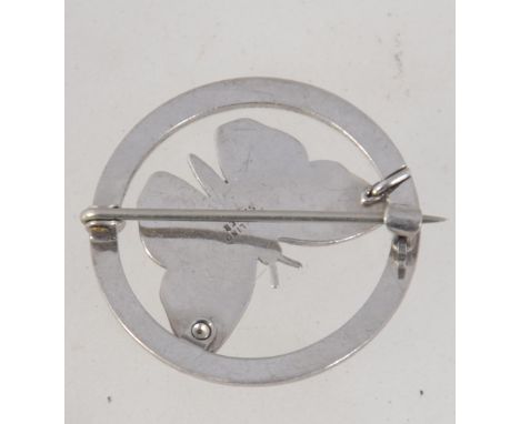 A vintage 925 silver and marcasite brooch pin in the form a butterfly within a roundel with C clip clasp. Marked Sterling Sil