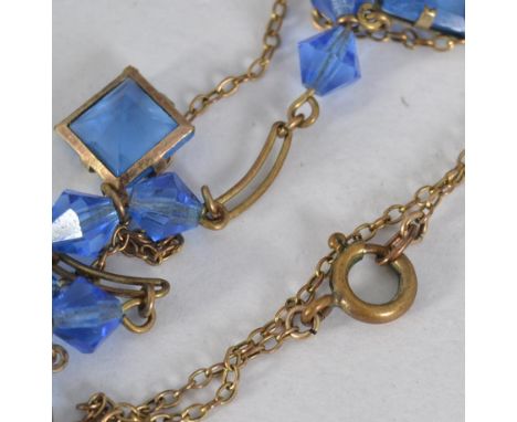 A vintage rolled gold drop pendant necklace with faceted drops with spring hoop clasp. Measures 16 inches plus drop.