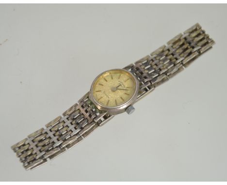 A good Rotary ladies silver hallmarked wristwatch and silver bracelet. The face with baton numerals. Weight 17.8g