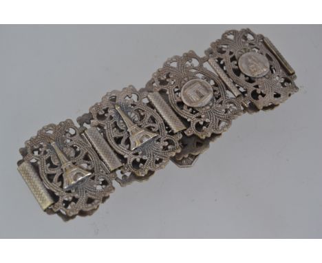 A vintage white metal link bracelet with Parisian souvenir motifs with hook clasp