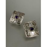 A pair of London silver and yellow metal set rectangular earrings with central cabochon amethyst