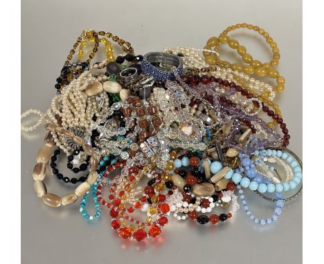 A large collection of Vintage and modern bead necklaces including lavender glass, paste pearls, moon stone, carnellian, horn,