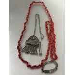 Property of the Late Countess Haig: A Eastern white metal arched pendant on barrel and chain link