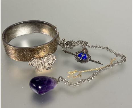 An Edwardian style silver stiff hinged bangle with 9ct gold front engraved panel, (D x 5.5 cm), a 9ct gold fine chain bracele