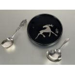 A Victorian silver shaped tea-caddy spoon with bright cut style decoration, London 1892, a