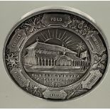 A 19thc relief cast white metal medal for the Bombay Gymkhana founded 1875, awarded in 1879 to T