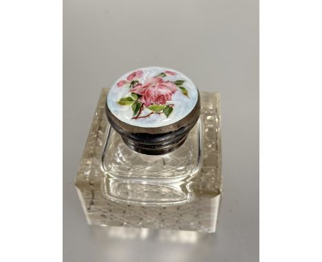 An Edwardian crystal inkwell of square form with Birmingham silver mounted guilloche rose decorated hinged top with original 