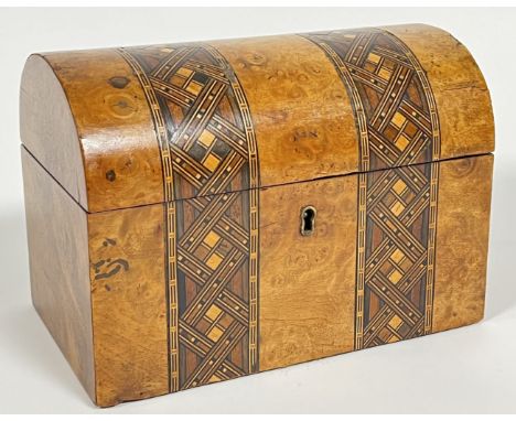 A dome-topped burr walnut tea caddy with geometric marquetry/Tunbridge ware inlaid bands (h- 15cm, w- 20.5cm)