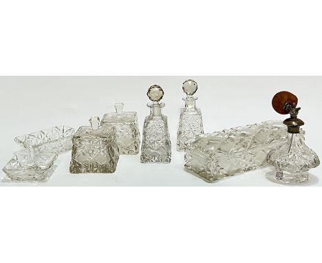 A cut glass dressing table set including a trinket dish, ring dish, boxes/bottled etc... and a sterling silver marked (SM) pe