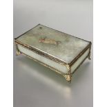 A Celladon jadeite rectangular box the top with pieced relief carved floral diagonal panels with