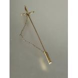 A late 19thc 15ct gold Renaissance sword style cloak pin of cruciform design with safety chain and