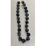 Property of the Late  Countess Haig: An imposing hawks eye large bead necklace, (Each bead 1.5 cm
