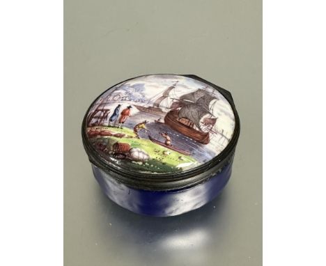 A late 18thc Continental circular enamel snuff box , the top with figures by the shore while ships unload, set in brass mount