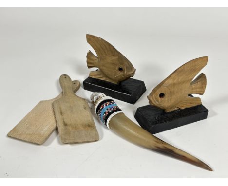 A pair of chipped wood Angel fish bookends with inset glass eyes, (H x 13.5 cm x L 13.5 cm ), a pair of vintage treen butter 