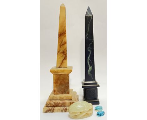 A mixed group of Egyptian style items comprising a carved jade-colour scarab beetle with hieroglyph inscription, a pair of Eg