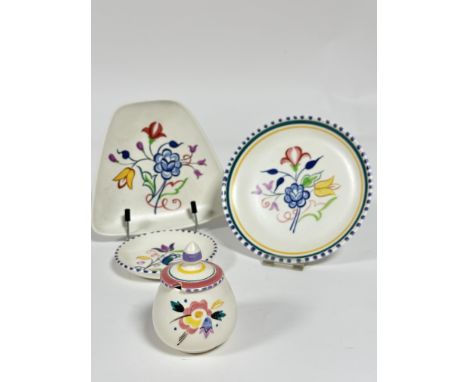 A collection of Poole pottery, including a mustard pot and cover, (H x 8 cm), a shaped dish and two circular dishes, ( D x 15