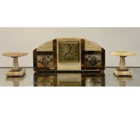 An impressive 1920's Art Deco clock garniture, comprised a domed mantel clock with onyx, agate and travertine segments, inset