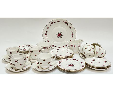 A mixed group of floral decorated tea wares (Crown Regent, Duchess china, Colclough, Queen Anne Bone China) comprising eight 