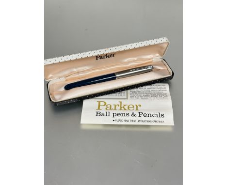 A vintage Mid- century Parker fountain pen with blue case and stainless steel cap in original fitted and instructions for car