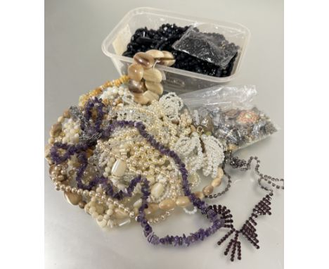 A horn graduated bead necklace, ( L x 22 cm), horn panel bracelet, and a collection of paste pearl necklaces's, a collection 