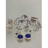 A pair of of white metal textured of nugget style earrings, ( L x 1 cm x W x 1.5 cm), , a pair of