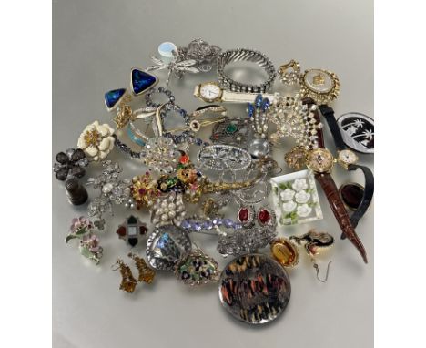 A collection of costume jewelry including paste necklaces, enamel clown brooch, yellow metal Victorian pearl set brooch, marc