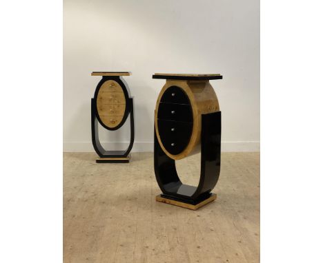 A pair of Art Deco style birds eye maple and black painted side tables, each with a rectangular stepped top above an ovoid ca
