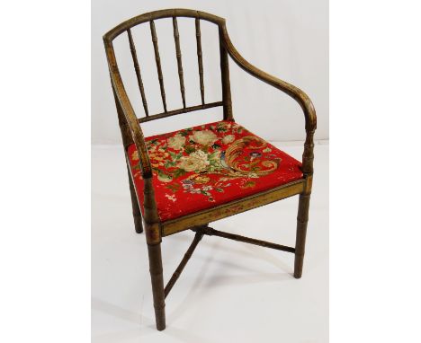 REGENCY PAINTED FAUX-BAMBOO ARMCHAIR, bar splat and downswept arms, needlework tapering seat, on bamboo form legs joined by X