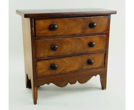 VICTORIAN MINIATURE WALNUT CHEST, fitted three long drawers over shaped apron, high bracket feet, 30 x 13.5 x 28cm Condition: